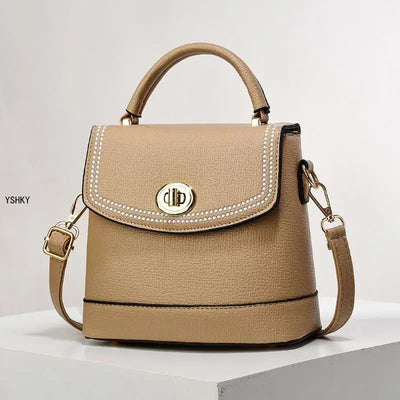 Luxury women's crossbody leather shoulder bag with designer detailing, ideal for office and occasion use.