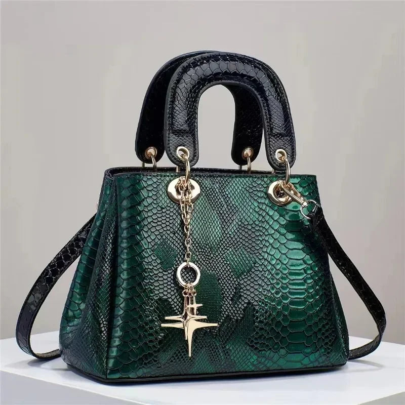 Snake patterned leather handbag